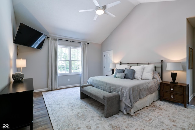 9154 Sargent Manor Ct, Indianapolis, IN 46256 - bedroom featuring light wood-type flooring, baseboards, ceiling fan, and high vaulted ceiling