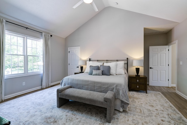 9154 Sargent Manor Ct, Indianapolis, IN 46256 - bedroom with wood finished floors, baseboards, ceiling fan, and high vaulted ceiling