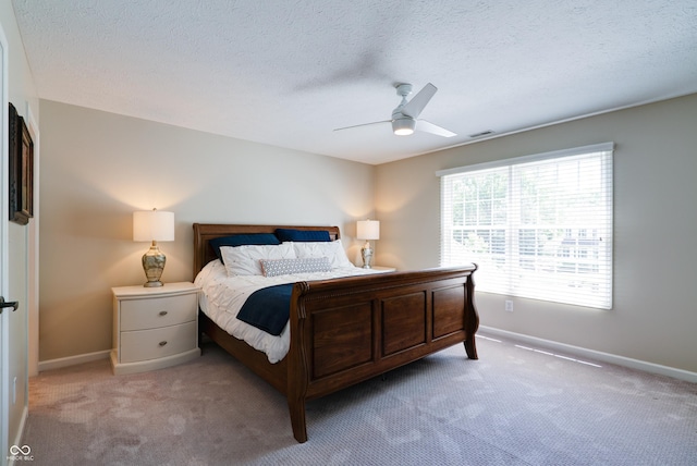 9154 Sargent Manor Ct, Indianapolis, IN 46256 - carpeted bedroom featuring baseboards, a textured ceiling, and a ceiling fan