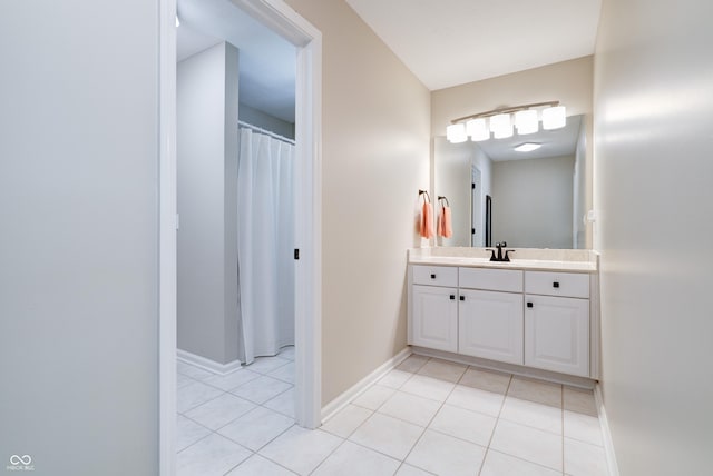 9154 Sargent Manor Ct, Indianapolis, IN 46256 - full bathroom featuring tile patterned flooring, vanity, and baseboards