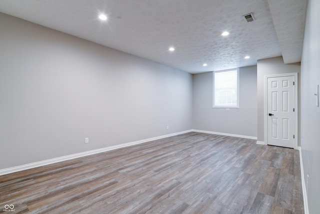 9154 Sargent Manor Ct, Indianapolis, IN 46256 - basement with baseboards, recessed lighting, and wood finished floors