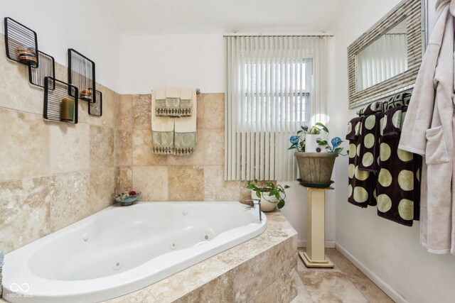 6210 Mckinley Ct, Indianapolis, IN 46220 - full bath with a whirlpool tub and baseboards