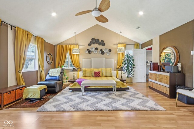 6210 Mckinley Ct, Indianapolis, IN 46220 - living area featuring ceiling fan, light wood-style flooring, and high vaulted ceiling