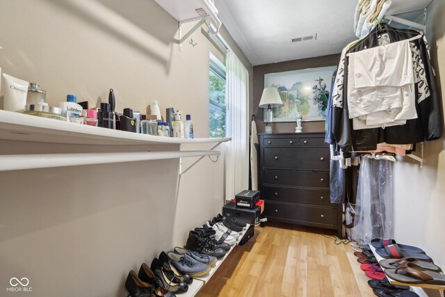 6210 Mckinley Ct, Indianapolis, IN 46220 - walk in closet featuring wood finished floors