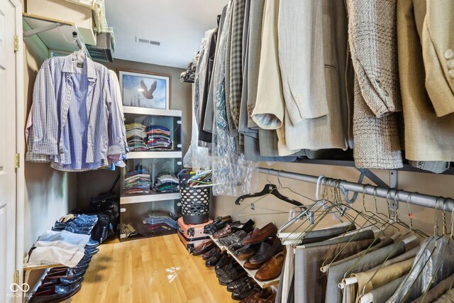 6210 Mckinley Ct, Indianapolis, IN 46220 - walk in closet featuring wood finished floors
