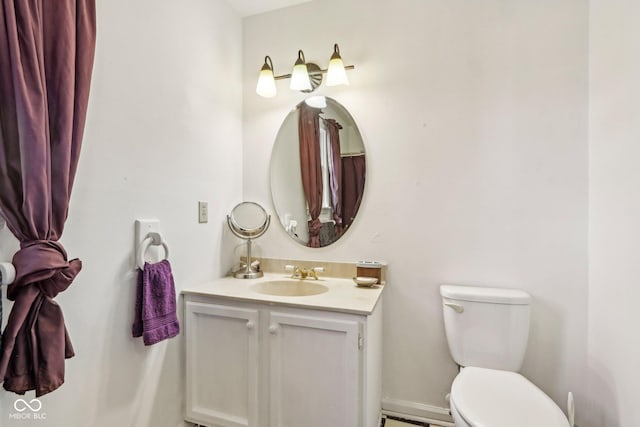 6210 Mckinley Ct, Indianapolis, IN 46220 - bathroom featuring toilet and vanity