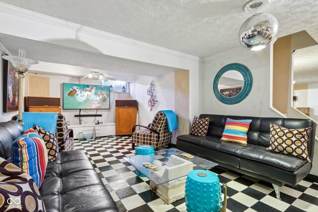 6210 Mckinley Ct, Indianapolis, IN 46220 - living room with tile patterned floors, crown molding, and a textured ceiling