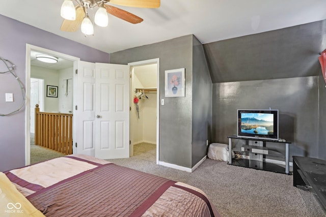6210 Mckinley Ct, Indianapolis, IN 46220 - bedroom with carpet floors, a spacious closet, a ceiling fan, baseboards, and a closet
