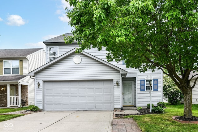 15411 Wandering Way, Noblesville, IN 46060 - traditional-style home with concrete driveway, an attached garage, and a front yard