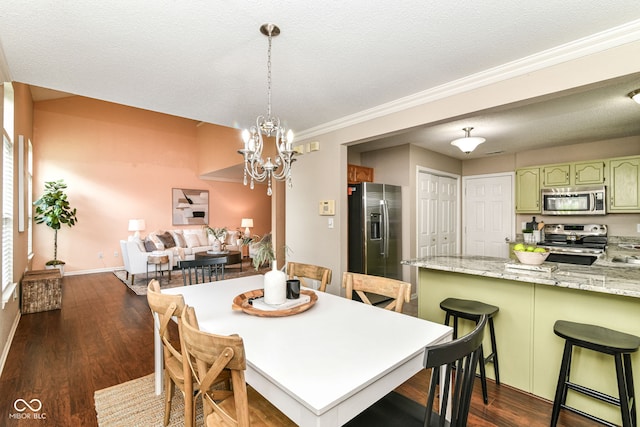 15411 Wandering Way, Noblesville, IN 46060 - dining area with a chandelier, baseboards, dark wood-style flooring, crown molding, and a textured ceiling