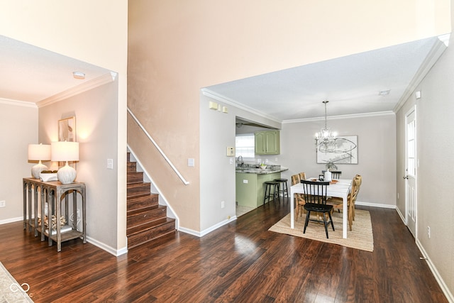 15411 Wandering Way, Noblesville, IN 46060 - dining room with dark wood finished floors, crown molding, stairway, a chandelier, and baseboards