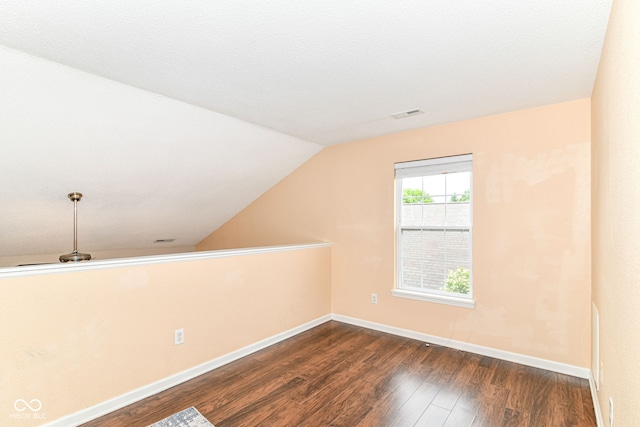 15411 Wandering Way, Noblesville, IN 46060 - additional living space with wood finished floors, baseboards, and vaulted ceiling