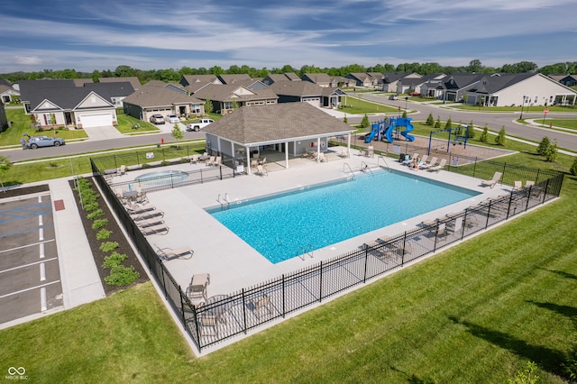 7145 Firestone Rd, Whitestown, IN 46075 - community pool featuring a residential view and a patio area