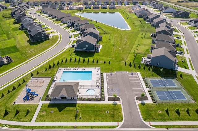 7145 Firestone Rd, Whitestown, IN 46075 - aerial view of residential area with a pool area and a nearby body of water