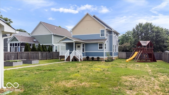 2448 Broadway St, Indianapolis, IN 46205 - back of property featuring a playground and a porch