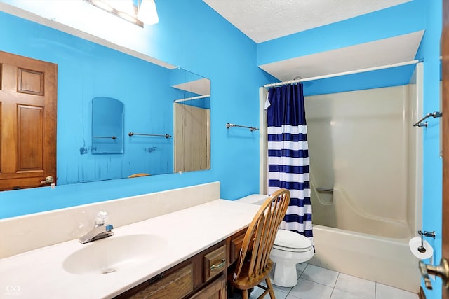 50 Charing Cross Rd, Indianapolis, IN 46217 - full bath with tile patterned flooring, shower / bath combo, toilet, vanity, and a textured ceiling