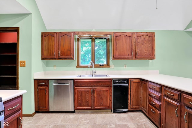 50 Charing Cross Rd, Indianapolis, IN 46217 - kitchen featuring stainless steel dishwasher, a sink, light countertops, and vaulted ceiling
