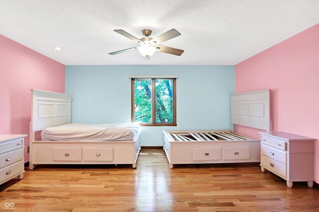50 Charing Cross Rd, Indianapolis, IN 46217 - bedroom featuring light wood-style flooring and a ceiling fan