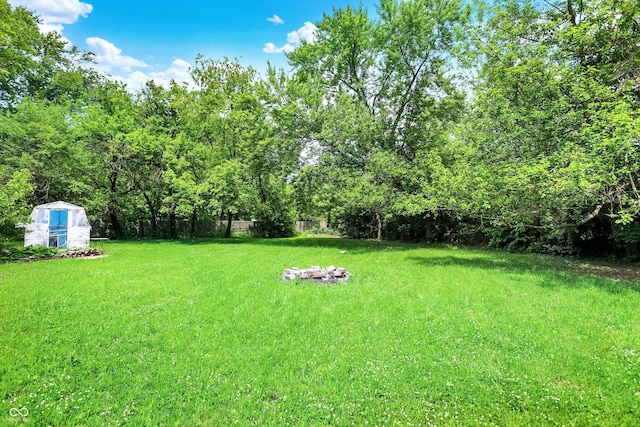 50 Charing Cross Rd, Indianapolis, IN 46217 - view of yard with an outdoor structure