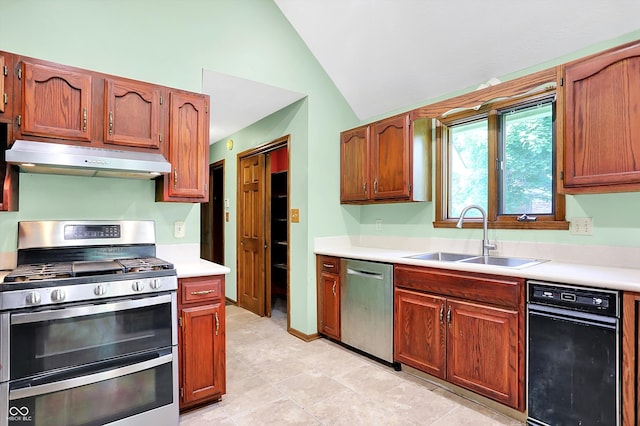 50 Charing Cross Rd, Indianapolis, IN 46217 - kitchen featuring appliances with stainless steel finishes, under cabinet range hood, a sink, light countertops, and high vaulted ceiling
