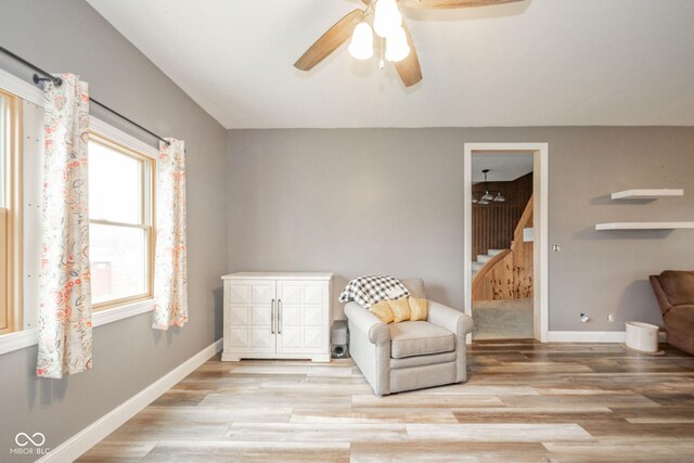 313 S Walnut St, New Castle, IN 47362 - sitting room with a ceiling fan, wood finished floors, baseboards, and stairs