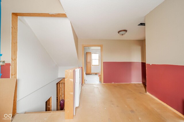 313 S Walnut St, New Castle, IN 47362 - hall with baseboards and wood finished floors