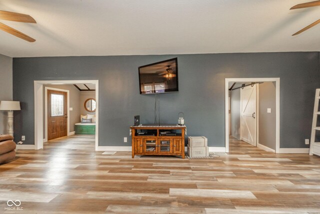313 S Walnut St, New Castle, IN 47362 - living area featuring ceiling fan, light wood-type flooring, and baseboards