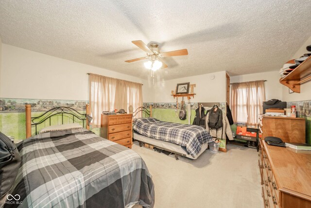 313 S Walnut St, New Castle, IN 47362 - carpeted bedroom featuring a textured ceiling and ceiling fan