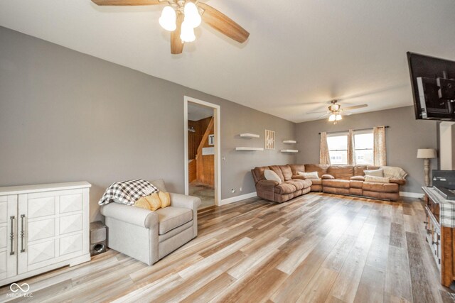 313 S Walnut St, New Castle, IN 47362 - living room featuring ceiling fan, light wood-style flooring, and baseboards