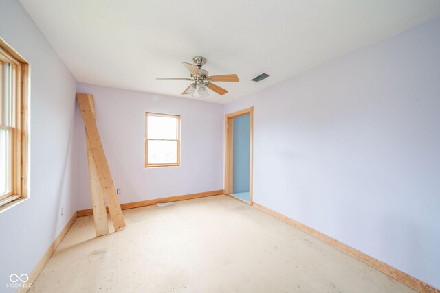 313 S Walnut St, New Castle, IN 47362 - unfurnished room featuring ceiling fan and baseboards