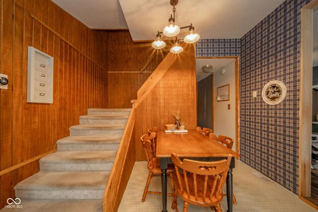 313 S Walnut St, New Castle, IN 47362 - dining room featuring stairway and wallpapered walls