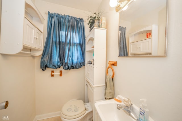 2900 Helms Rd, Anderson, IN 46016 - bathroom featuring toilet and a sink