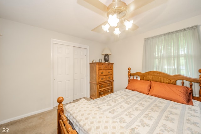 2900 Helms Rd, Anderson, IN 46016 - bedroom featuring carpet floors, a closet, baseboards, and ceiling fan