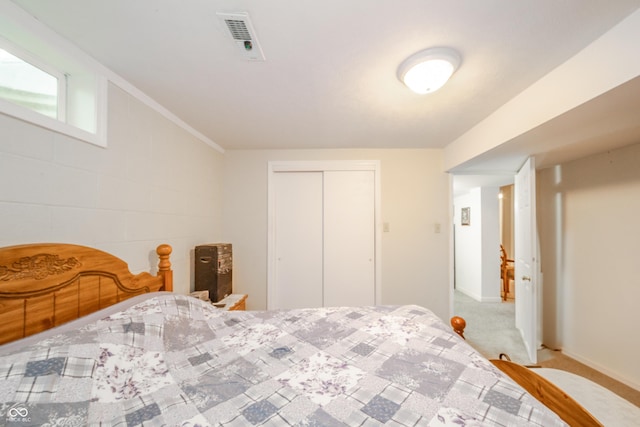 2900 Helms Rd, Anderson, IN 46016 - carpeted bedroom featuring a closet and baseboards