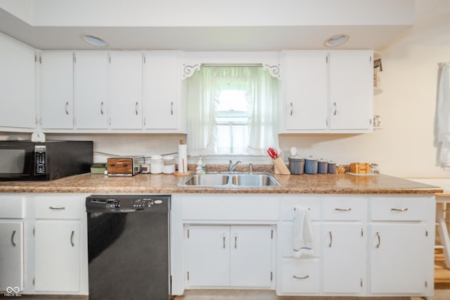 2900 Helms Rd, Anderson, IN 46016 - kitchen with black appliances, a sink, white cabinets, and light countertops