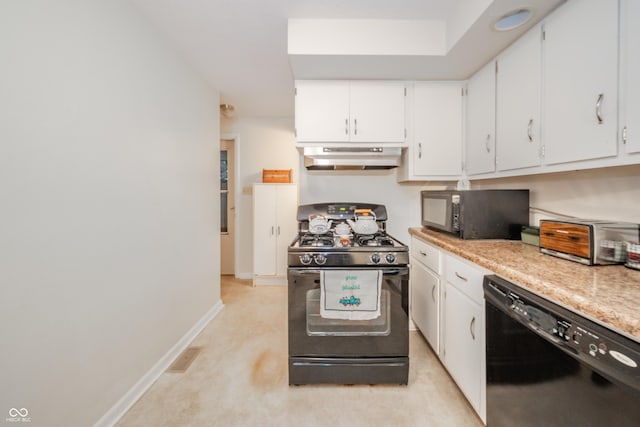 2900 Helms Rd, Anderson, IN 46016 - kitchen featuring black appliances, under cabinet range hood, white cabinets, and baseboards