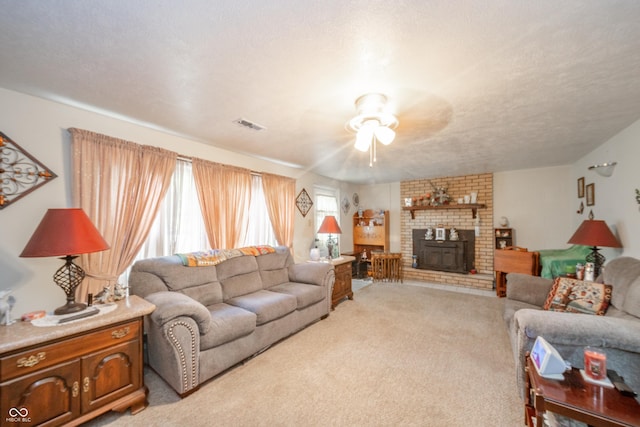 2900 Helms Rd, Anderson, IN 46016 - living room with a ceiling fan, light carpet, and a brick fireplace