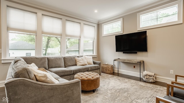 5254 N Park Ave, Indianapolis, IN 46220 - living room featuring crown molding, baseboards, and wood finished floors
