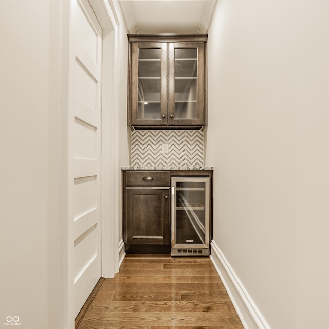 5254 N Park Ave, Indianapolis, IN 46220 - bar featuring beverage cooler and wood finished floors