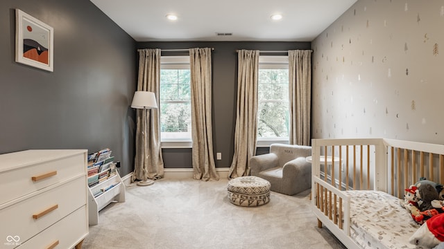 5254 N Park Ave, Indianapolis, IN 46220 - bedroom featuring light colored carpet, baseboards, a nursery area, and recessed lighting