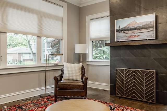 5254 N Park Ave, Indianapolis, IN 46220 - living area featuring crown molding, dark wood-style flooring, and baseboards
