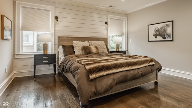 5254 N Park Ave, Indianapolis, IN 46220 - bedroom with dark wood-style flooring, baseboards, and ornamental molding