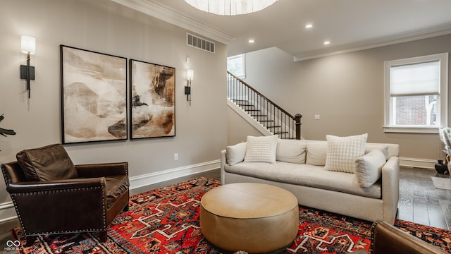5254 N Park Ave, Indianapolis, IN 46220 - living area featuring crown molding, wood finished floors, baseboards, healthy amount of natural light, and recessed lighting