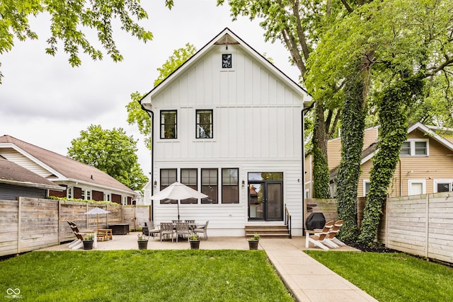 5254 N Park Ave, Indianapolis, IN 46220 - back of property featuring entry steps, board and batten siding, and a patio
