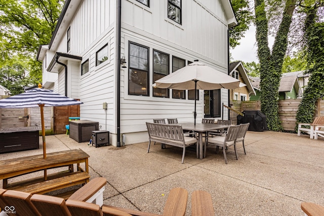 5254 N Park Ave, Indianapolis, IN 46220 - view of patio / terrace featuring a jacuzzi, outdoor dining area, and grilling area