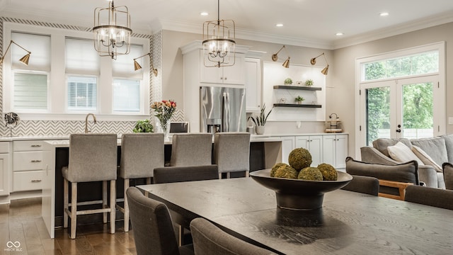 5254 N Park Ave, Indianapolis, IN 46220 - dining room featuring a chandelier, dark wood-style floors, recessed lighting, and ornamental molding