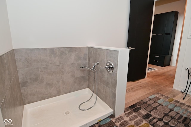 7070 Dean Rd, Indianapolis, IN 46220 - bathroom with wood finished floors and a tile shower