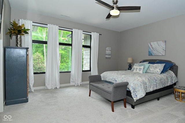 7070 Dean Rd, Indianapolis, IN 46220 - bedroom featuring baseboards, carpet, and a ceiling fan