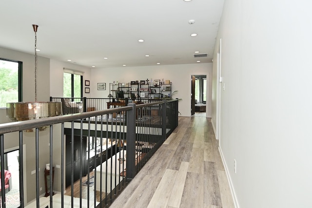 7070 Dean Rd, Indianapolis, IN 46220 - hallway featuring wood finished floors, recessed lighting, and baseboards