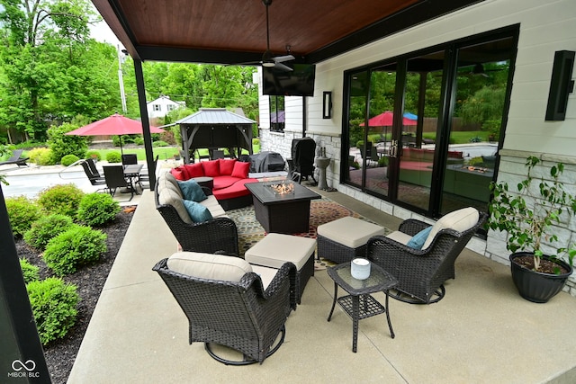 7070 Dean Rd, Indianapolis, IN 46220 - view of patio with an outdoor living space with a fire pit and ceiling fan